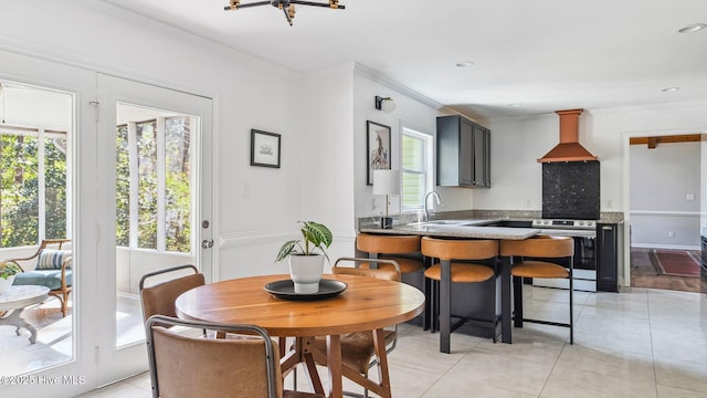 dining space with recessed lighting, crown molding, and light tile patterned floors