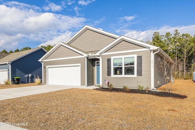 single story home featuring a front lawn, driveway, and an attached garage