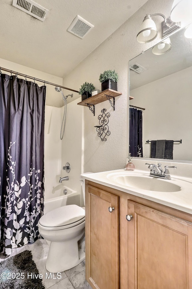 full bathroom with visible vents, vanity, toilet, and shower / bath combo with shower curtain