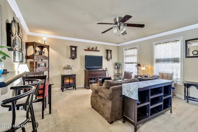 living room featuring ornamental molding, carpet flooring, a wood stove, and baseboards