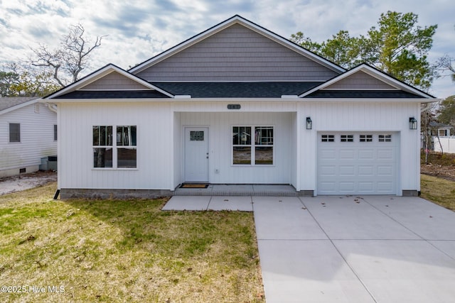 view of front of property with a garage, a shingled roof, concrete driveway, a front lawn, and a porch