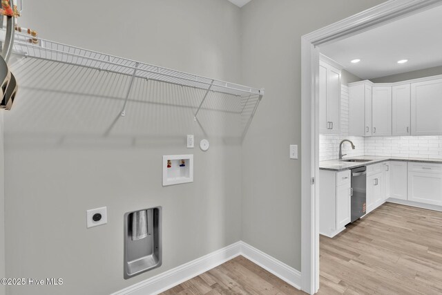 147 NE 18th St, Oak Island, NC 28465 - full bath with a shower, wood finished floors, vanity, and baseboards
