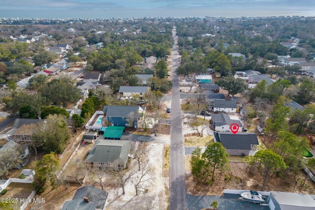 147 NE 18th St, Oak Island, NC 28465 - aerial overview of property's location with a large body of water
