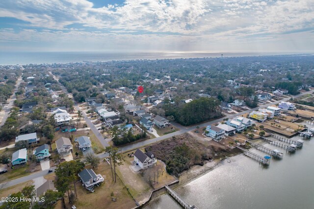 147 NE 18th St, Oak Island, NC 28465 - view of property location with a nearby body of water