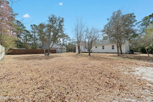 view of yard with fence