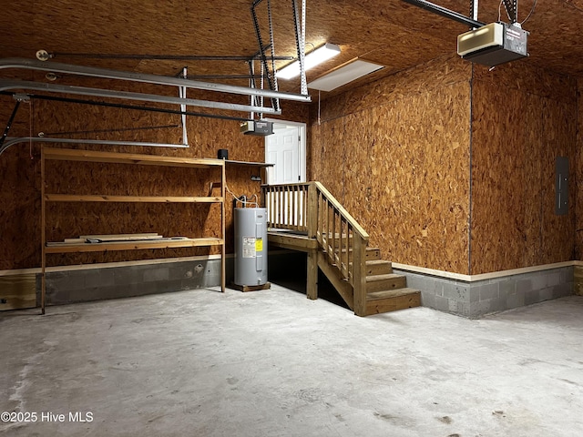 garage featuring a garage door opener and water heater