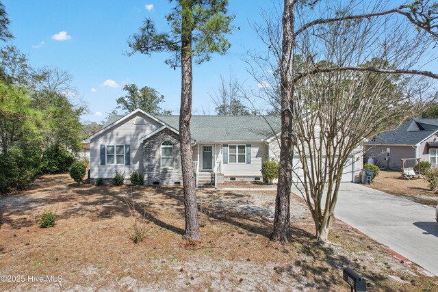 single story home with crawl space, concrete driveway, and a shingled roof