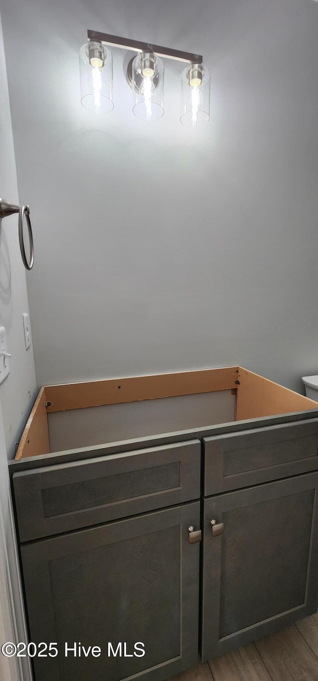 bathroom featuring wood finished floors