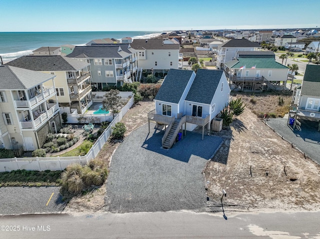 aerial view with a water view and a residential view