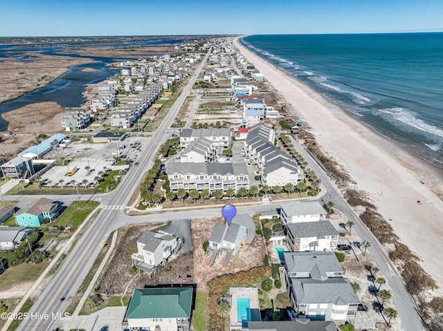 aerial view featuring a beach view and a water view