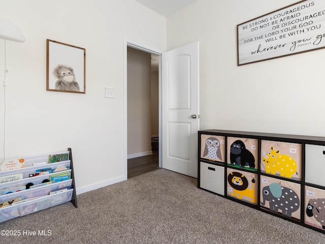 playroom with carpet and baseboards