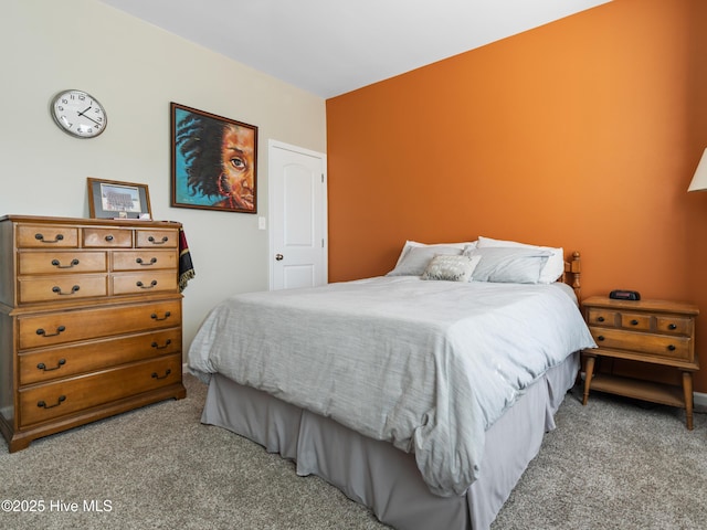 bedroom featuring carpet flooring