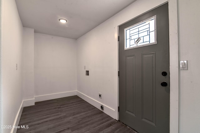 entryway with dark wood-style floors and baseboards