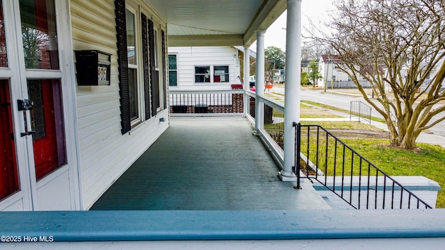 view of patio featuring a porch