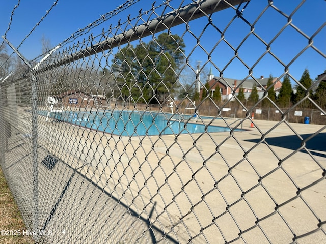 community pool with fence