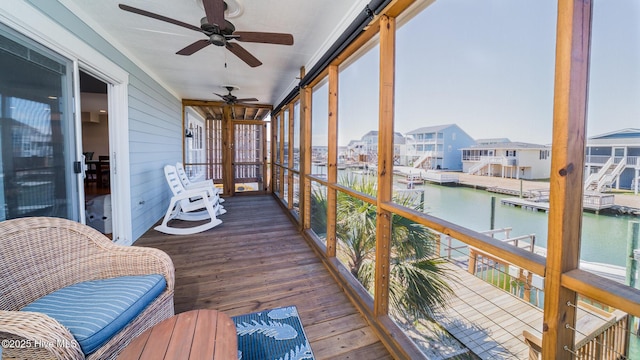 sunroom with a water view