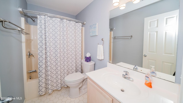 full bathroom featuring shower / bath combination with curtain, tile patterned flooring, vanity, and toilet