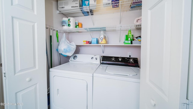 laundry room with laundry area and independent washer and dryer