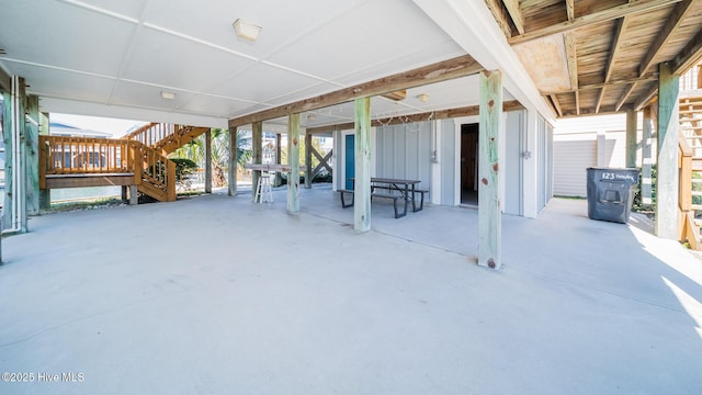 view of patio featuring stairway