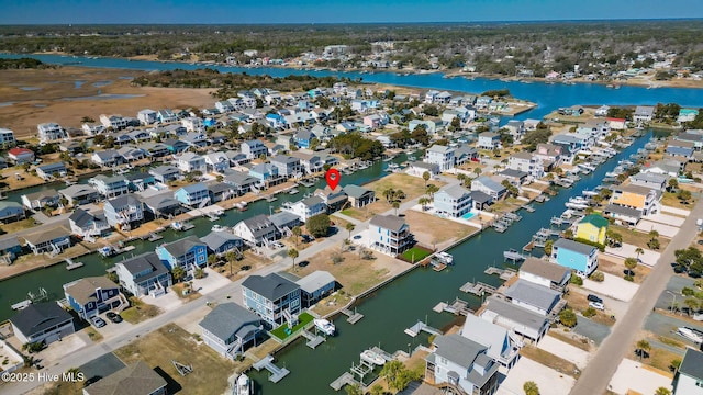 aerial view with a water view and a residential view