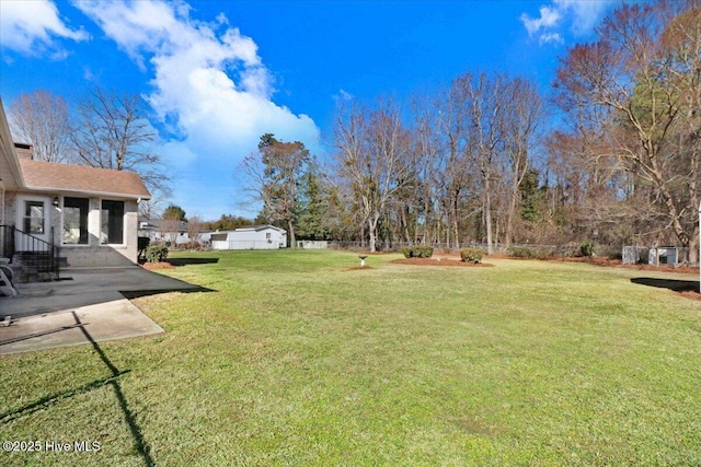 view of yard featuring a patio area