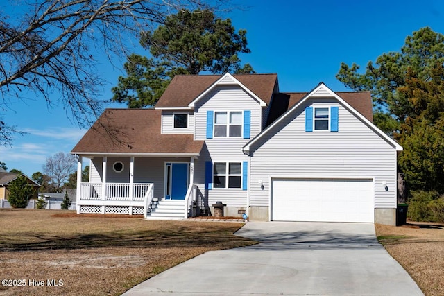 traditional-style home featuring driveway, an attached garage, a front lawn, and a porch