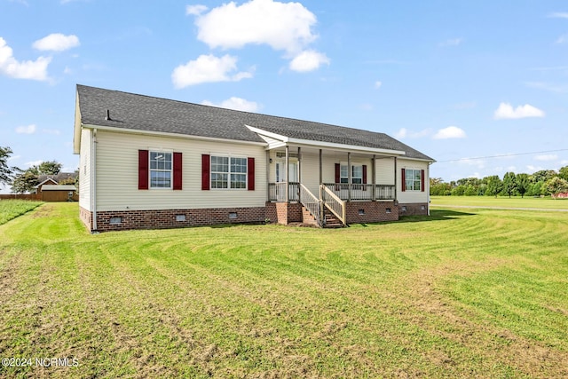 view of front of property featuring a porch, crawl space, roof with shingles, and a front lawn