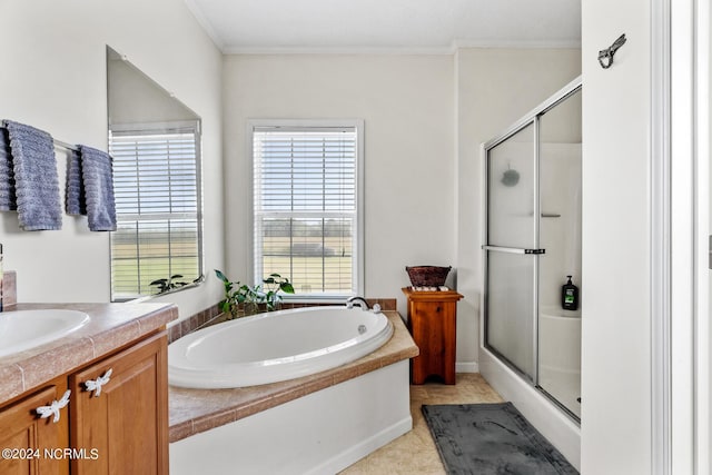 bathroom with a garden tub, crown molding, a shower stall, and vanity