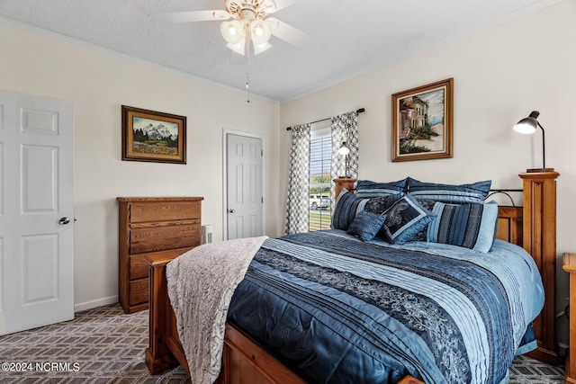 bedroom with baseboards, a ceiling fan, dark colored carpet, a textured ceiling, and crown molding