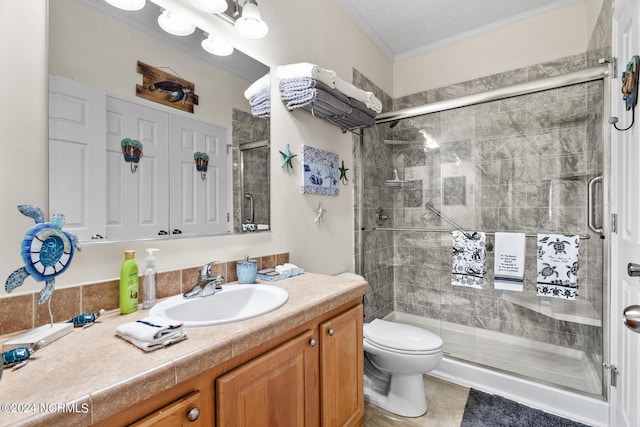 full bath with toilet, ornamental molding, a textured ceiling, vanity, and a shower stall