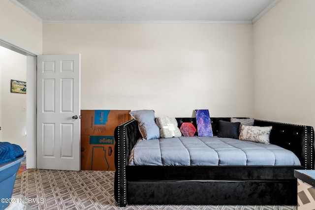 bedroom featuring carpet floors and crown molding