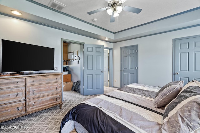 bedroom featuring carpet, visible vents, and a ceiling fan