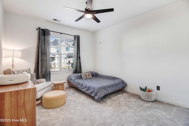 bedroom with ceiling fan, carpet, visible vents, and baseboards