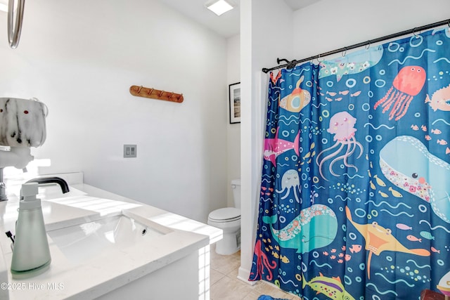 full bath featuring vanity, curtained shower, tile patterned flooring, and toilet