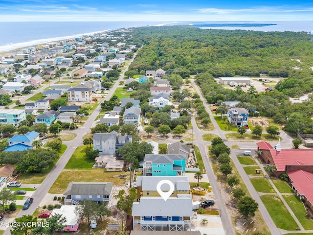 drone / aerial view featuring a water view and a residential view