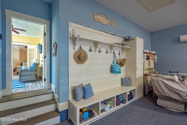 mudroom featuring carpet floors and a ceiling fan