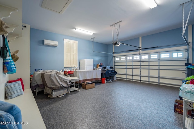 garage with freestanding refrigerator, a garage door opener, and a wall mounted air conditioner