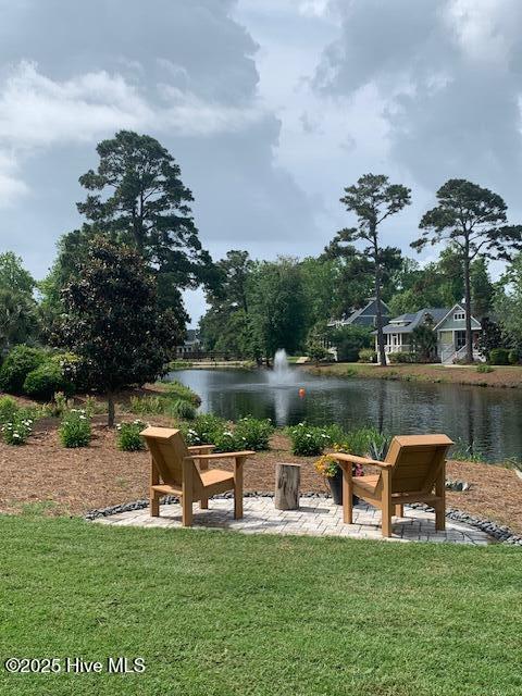 6430 Craller Way, Ocean Isle Beach, NC 28469 - view of grassy yard featuring a water view