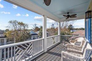 6430 Craller Way, Ocean Isle Beach, NC 28469 - wooden deck featuring ceiling fan