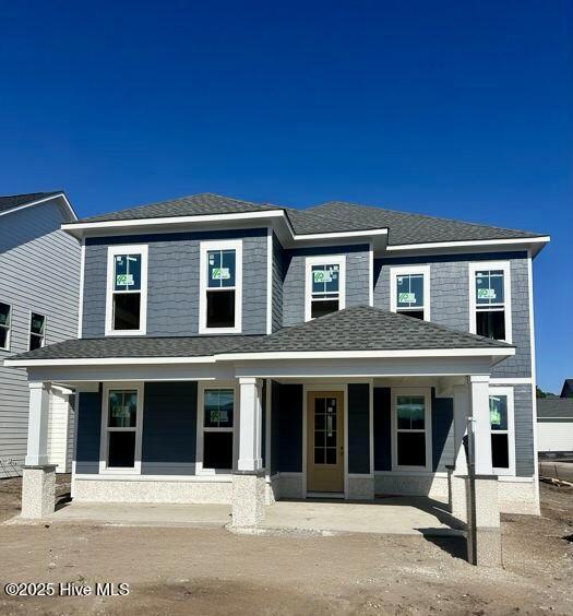 3927 Watersail Dr Unit 93, Wilmington, NC 28409 - view of front facade featuring covered porch