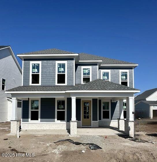 3927 Watersail Dr Unit 93, Wilmington, NC 28409 - view of front of home with covered porch