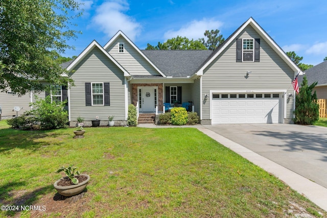 view of front facade with covered porch, a garage, brick siding, driveway, and a front lawn