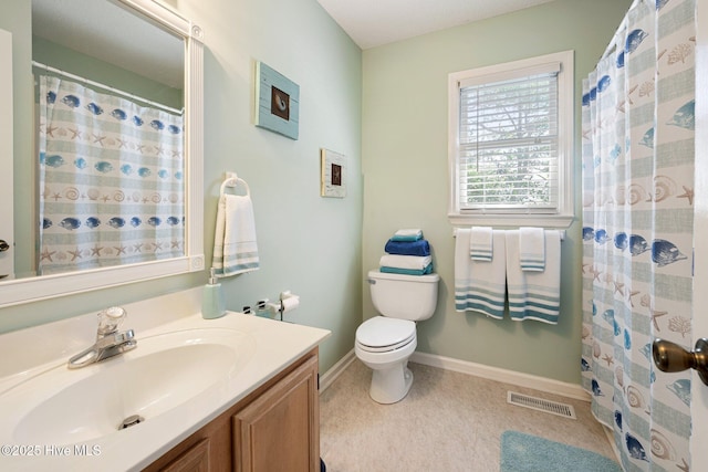bathroom with baseboards, visible vents, toilet, a shower with curtain, and vanity