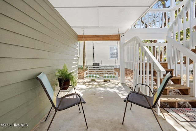 view of patio / terrace with stairway