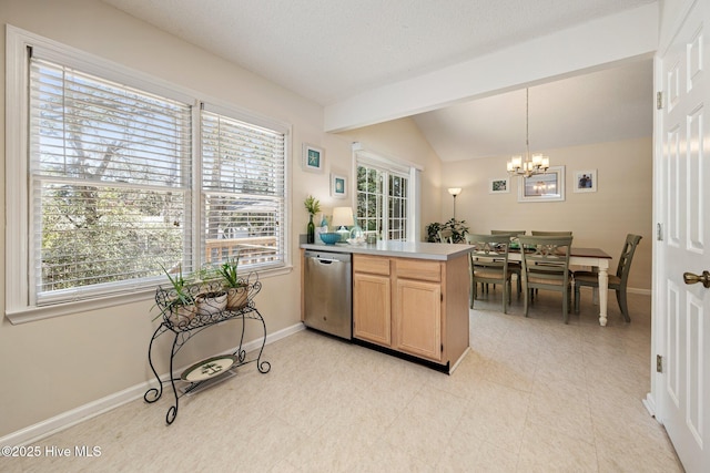 kitchen with dishwasher, a peninsula, plenty of natural light, and vaulted ceiling with beams