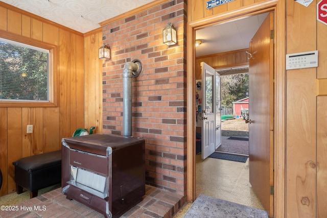 bathroom with wood walls and a wood stove