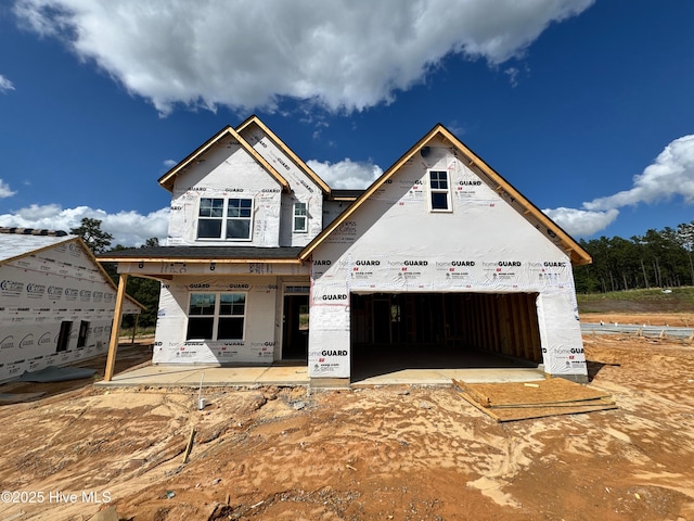 unfinished property with covered porch