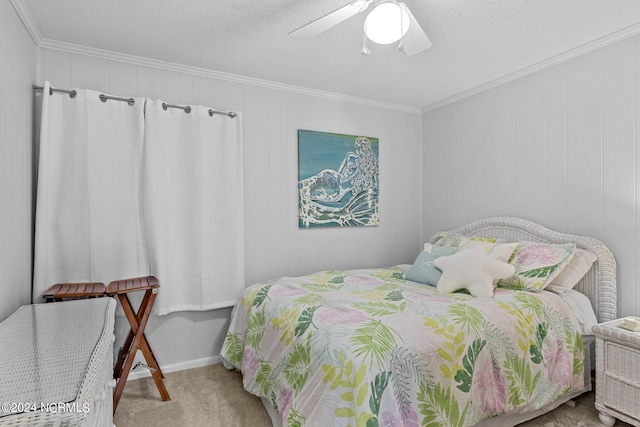 carpeted bedroom with a ceiling fan, crown molding, and a textured ceiling