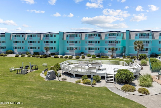 view of community featuring a lawn