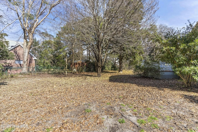 view of yard featuring fence